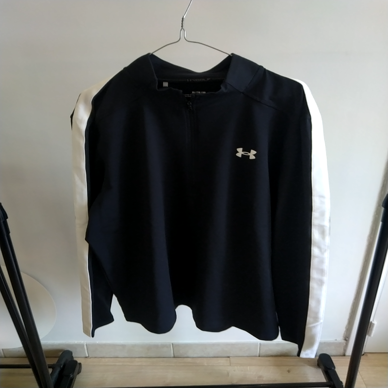 Image de Under Armour - Vêtement de Golf Veste Coupe Large Noir/Blanc disponible sur ekwip