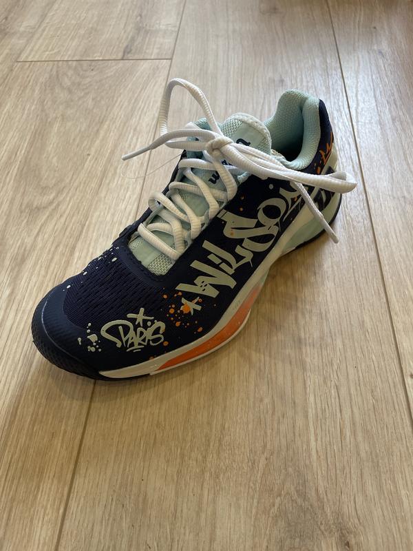 Image de Wilson - Chaussures de Tennis Rush Pro 4.0 Paris Hope Bleu/Orange disponible sur ekwip