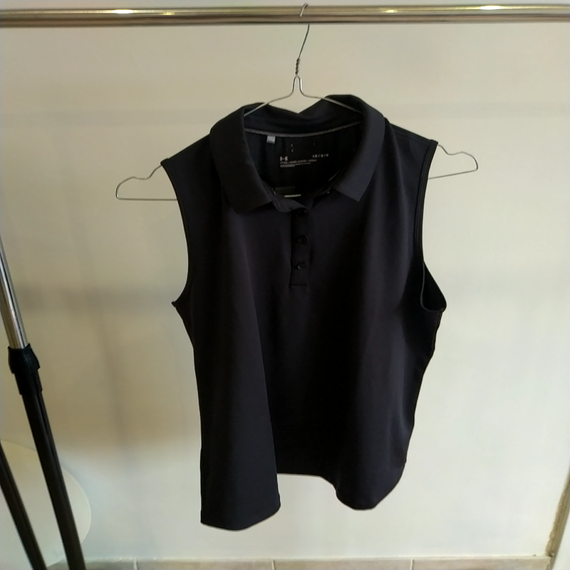 Image de Under Armour - Vêtement de Golf Polo Sans Manches Femme Noir disponible sur ekwip