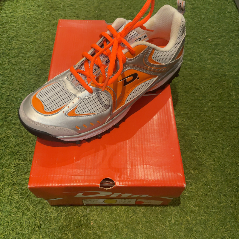 Image de Dita - Chaussures de Hockey Comfort Gris/Orange disponible sur ekwip